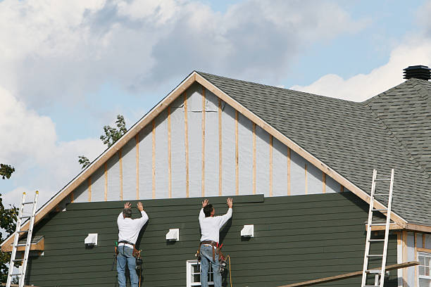 Professional Siding Installation technician working in Laurel, IN